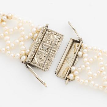 Collier och armband seed pärlor 18K guld med rosenslipade diamanter.