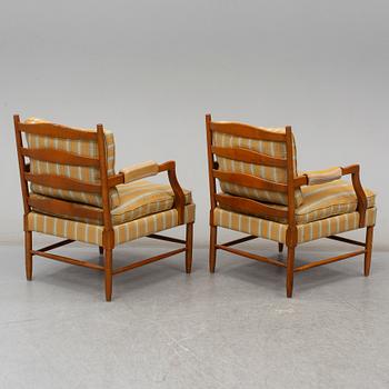 a pair of armchairs from the second half of the 20th century.