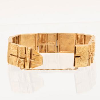 An 18K gold bracelet "Neliönmuodot/Quadrate forms" by Björn Weckström for Lapponia.