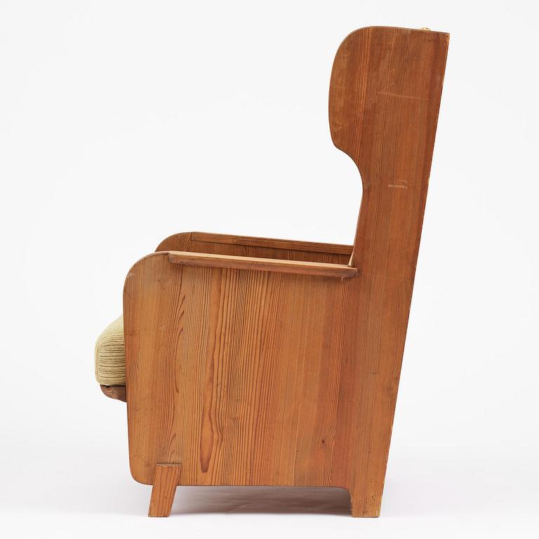 Axel Einar Hjorth, a stained pine "Lovö" armchair, Nordiska Kompaniet, Sweden, 1930s.