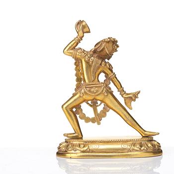 A gilt bronze figure of Dakini, Tibeto-Chinese, 19th Century.