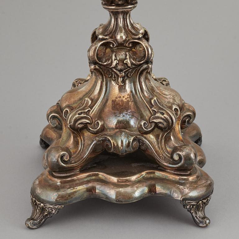 A pair of barocque style nine lights candelabra, silver plate, 20th Century.