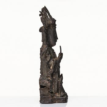 A bronze scultpure of Guanyin, Ming dynasty (1368-1644).