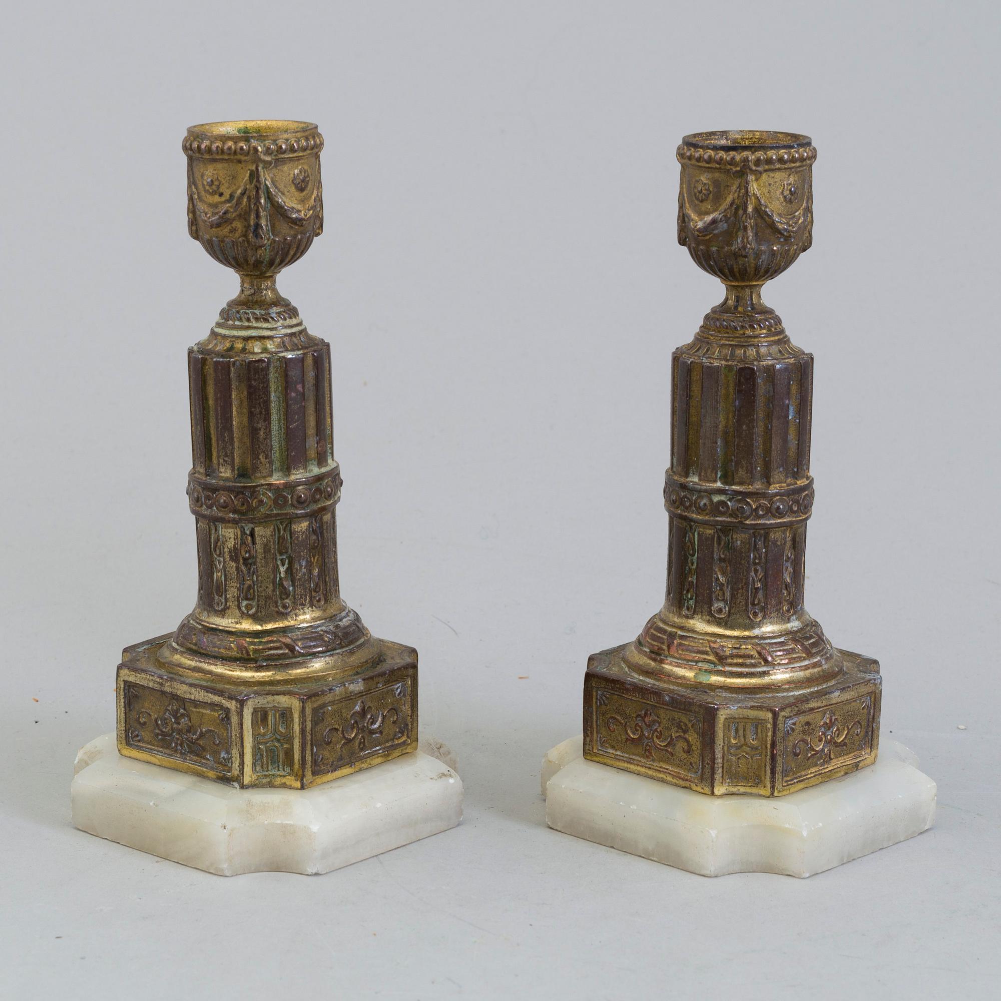 A PAIR OF BRASS AND ALABASTER GUSTAVIAN STYLE CANDLESTICKS, 19th century.