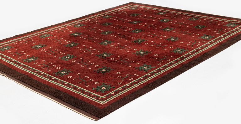 Nea Hållfast, attributed, a carpet, knotted pile, c 350 x 272 cm, signed KH.