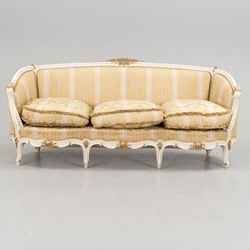 a 1930s rococo style sofa.