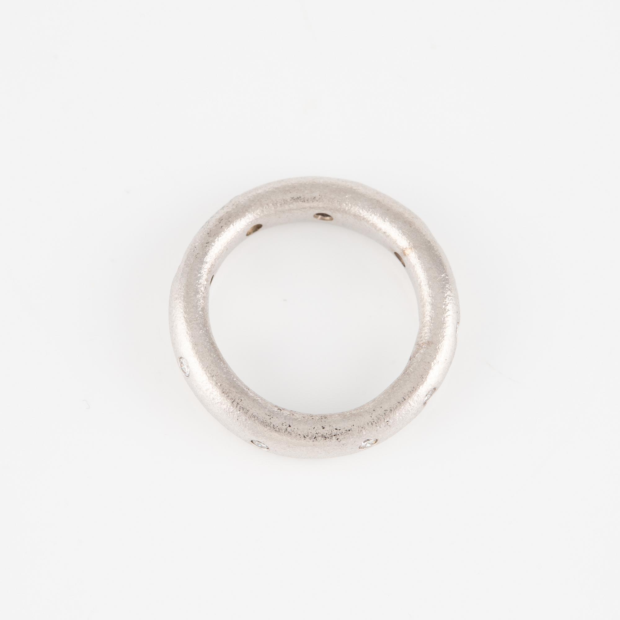 Ole Lynggaard two "Love" rings no. 4 in 18K white gold with round brilliant-cut diamonds.