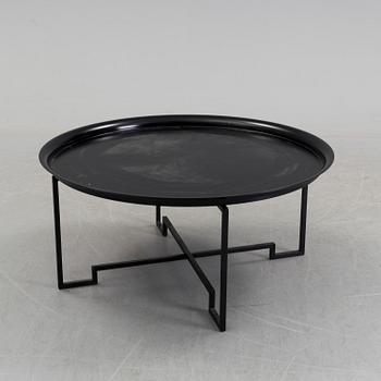 A coffee table designed in 2000 by Per Öberg for Svensk Tenn.