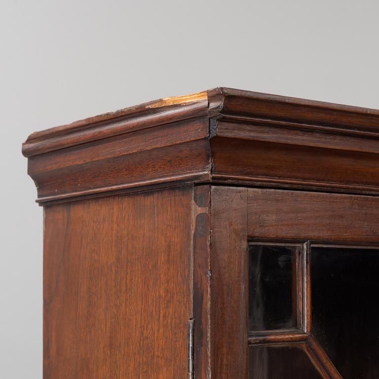 An English mahogany cabinet, 19th Century.