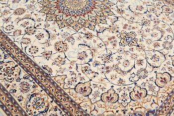 A carpet, Nain part silk, 361 x 262 cm.