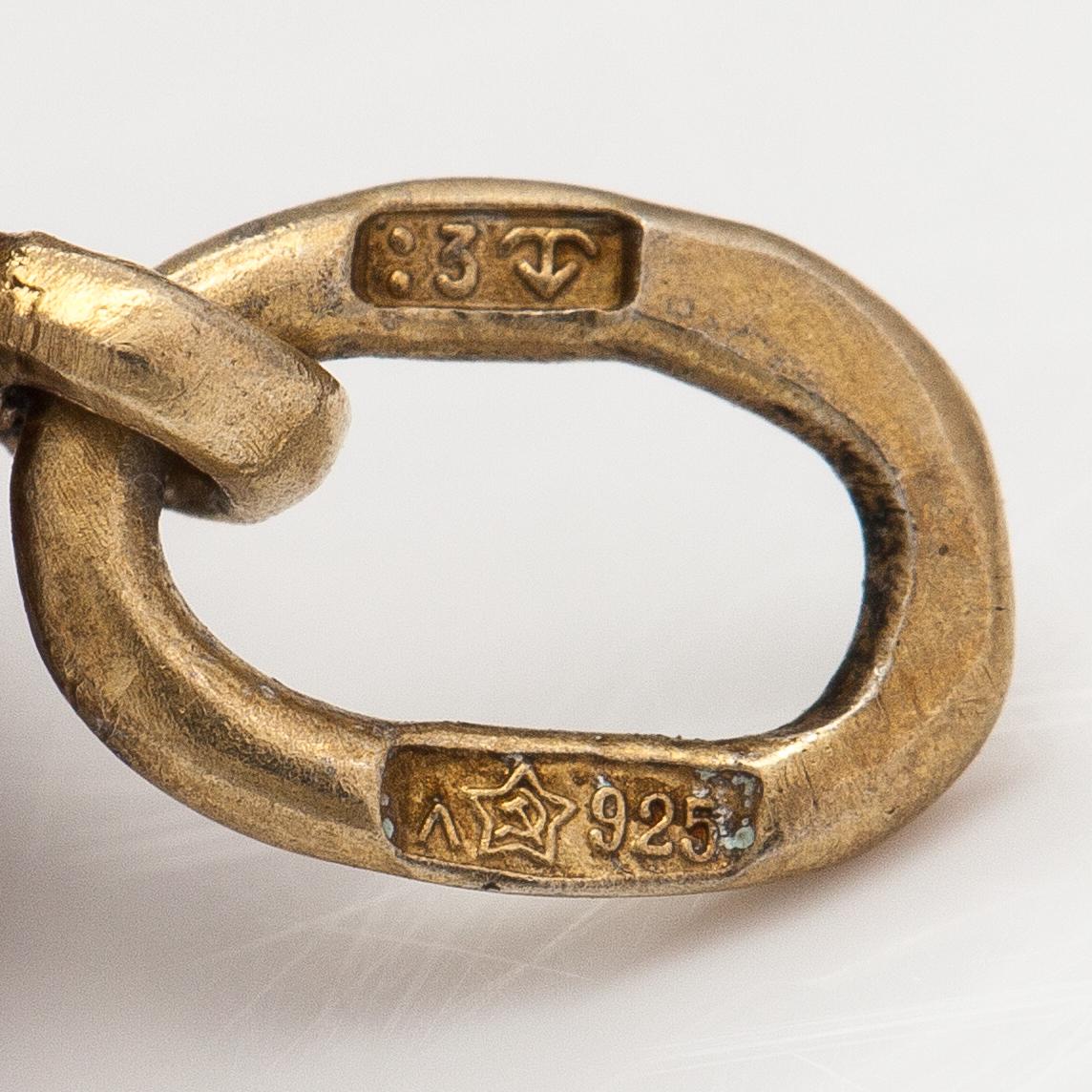 An egg pendant made of sterling silver and enamel. Import marked Kultakeskus, Helsinki.