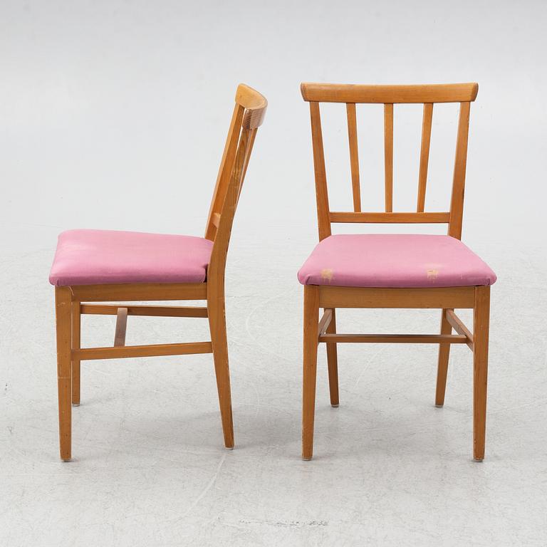 Carl Malmsten, dining table and four chairs, including Svensk Fur, second half of the 20th century.