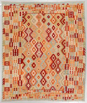 A kelim rug, ca 293 x 253 cm.