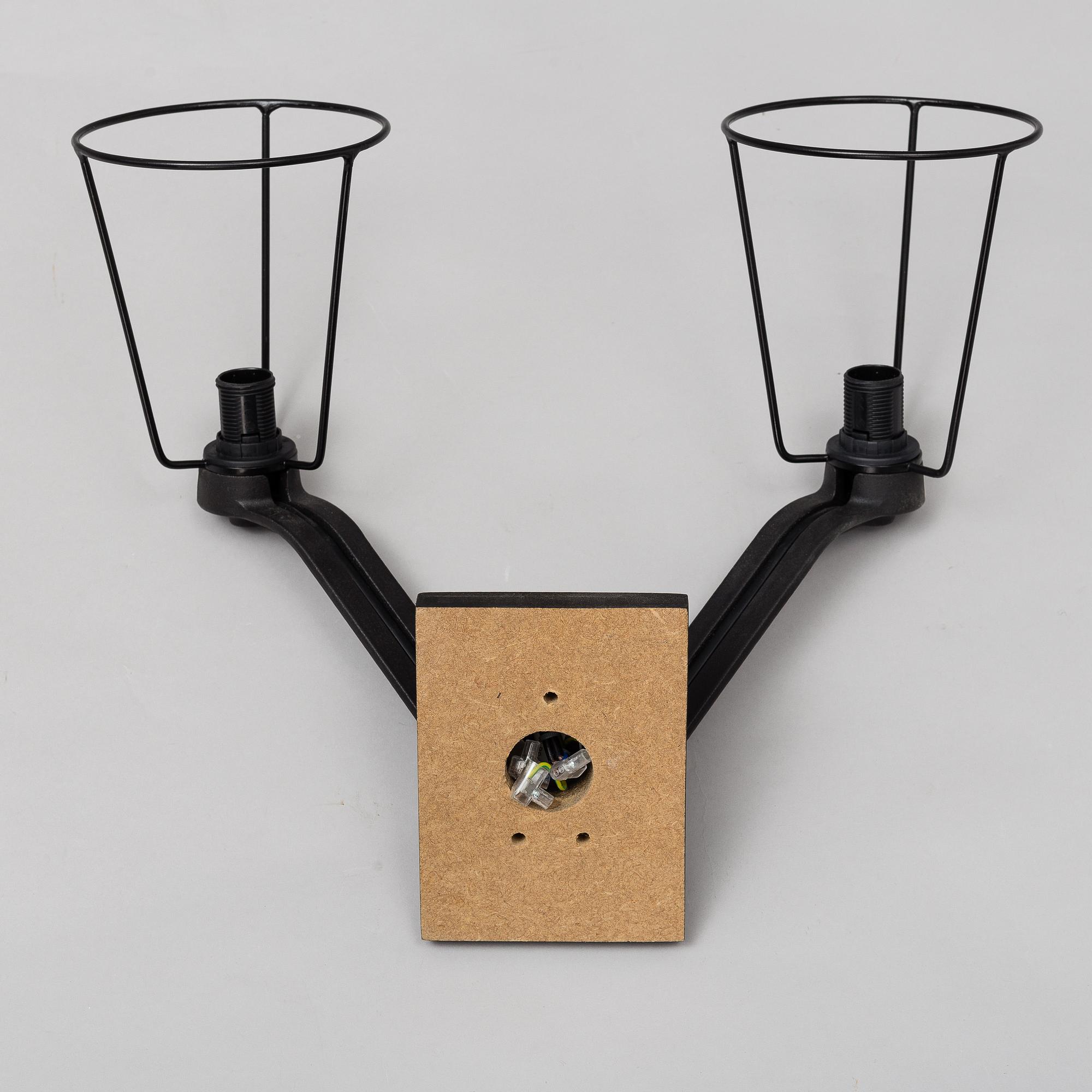 TOM DIXON, a pair of 'Base' wall light.