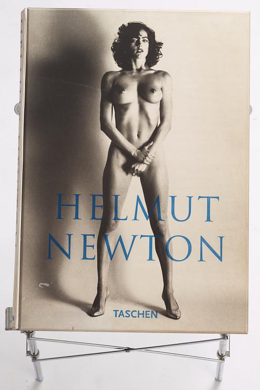 Helmut Newton, Signed book published by Taschen, Monte Carlo, 1999, ed 10000, with a metal table.