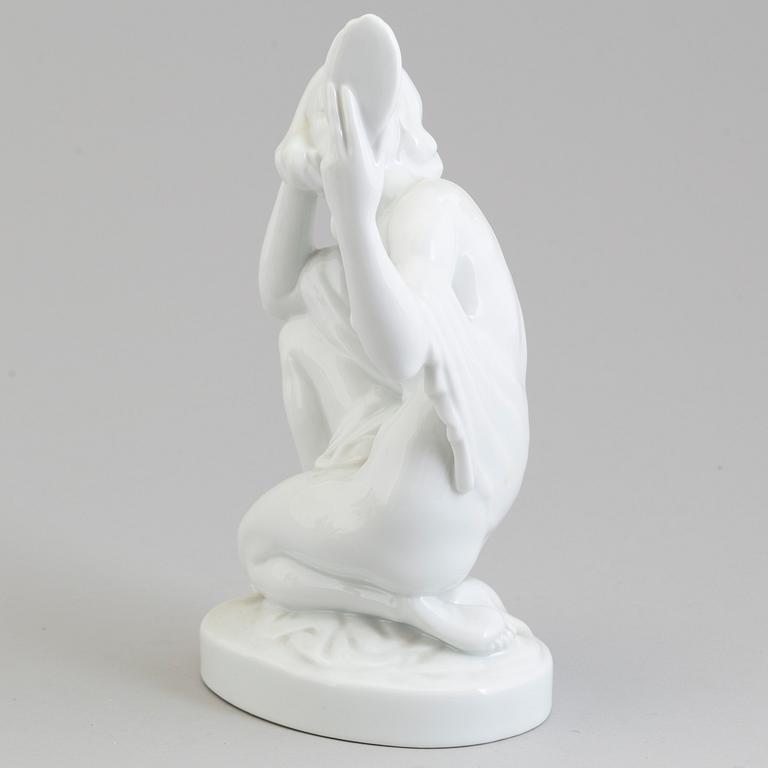 A Herend white glazed porcelain figure, Hungary, 20th Century.