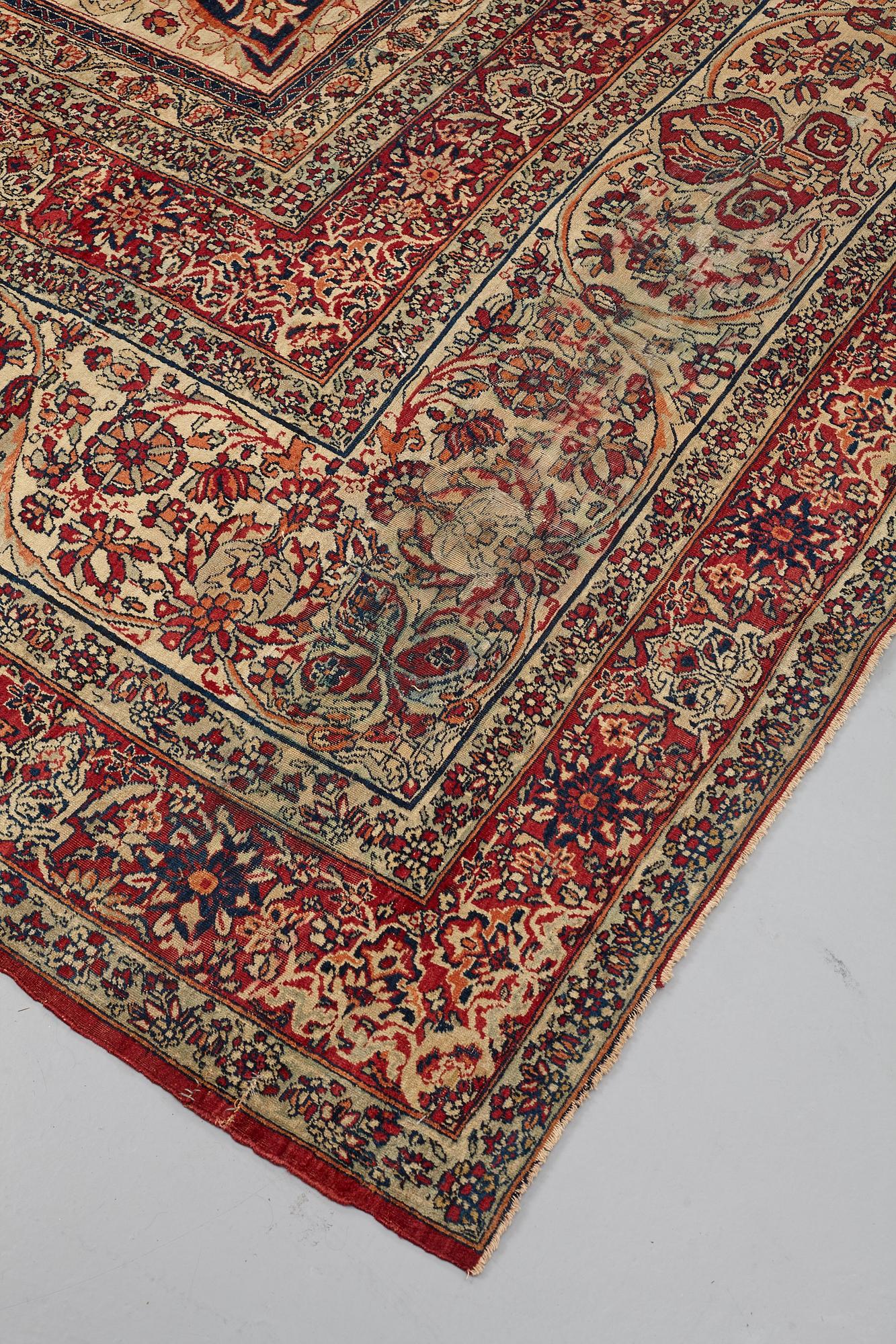 A carpet, an antique Kerman Laver, ca 677-688,5 x 510,5-526 cm.
