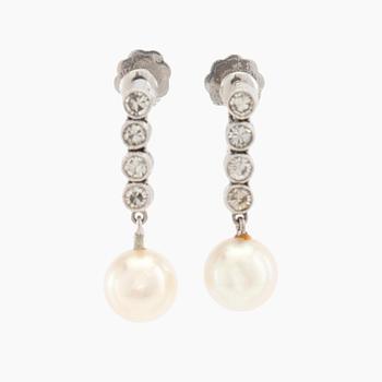 Earrings, a pair of 18K white gold set with round brilliant-cut diamonds and cultured pearls.