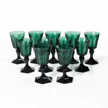 Eleven white wine glasses, green, 19th century.