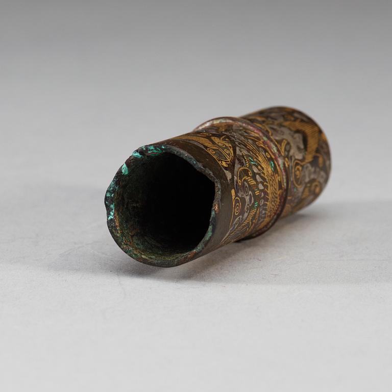 An archaistic bronze piece for a cane.