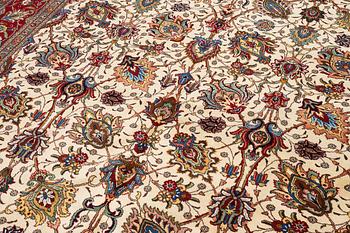 A Tabriz carpet, Northwestern Iran, of Safavid 'palmette' design, c, 483 x 302 cm.