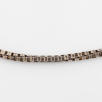 Silver necklace.