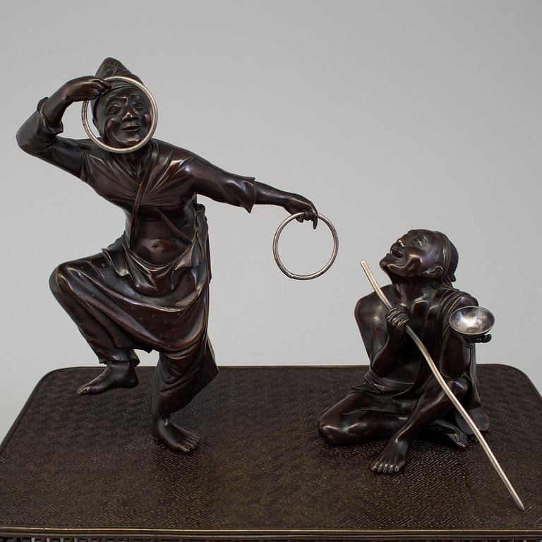 A Japanese bronze sculpture group, Meiji period (1868-1912).