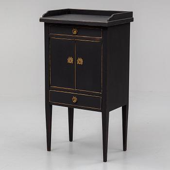 A gustavian style bedside table, mid 20th century.