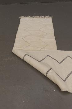 A Moroccan runner carpet, 290 x 70 cm.