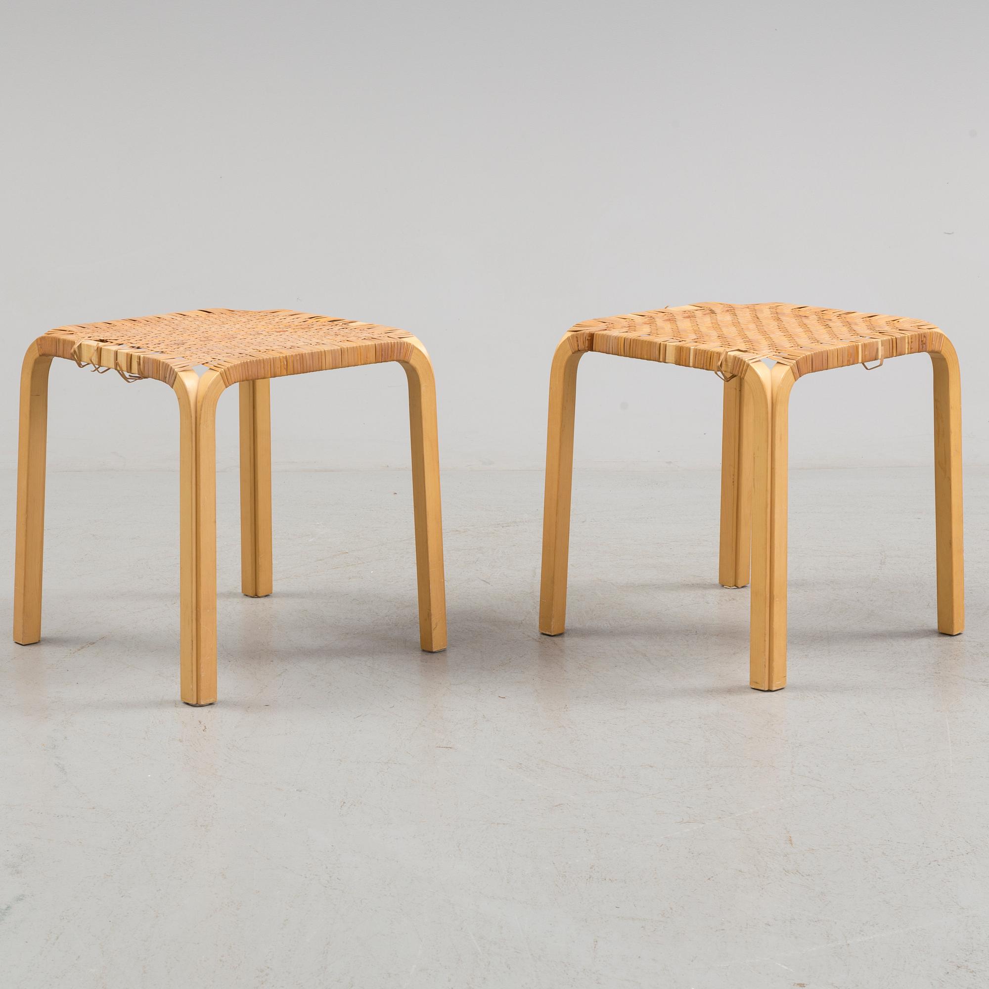 A pair of 1950s / 60s Alvar Aalto Y 61 stools.