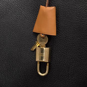 Hermès  Evergrain Garment Bag.