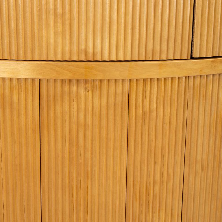 Corner cabinet, circa the mid-20th century.