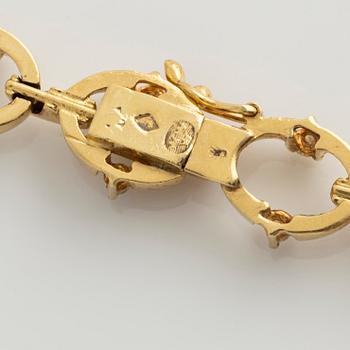 Collier 18K guld med runda briljantslipade diamanter.