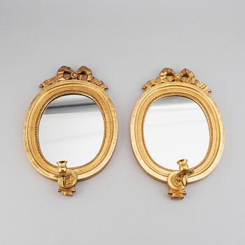 A mirror and a pair of mirror scones, gustavian style, 20th century.