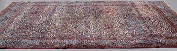 A CARPET, semi-antique, Kerman, ca 362,5 x 265 cm.