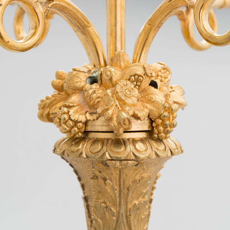 A latter half of the 19th-century candelabrum/ table light, altered in the 20th century.
