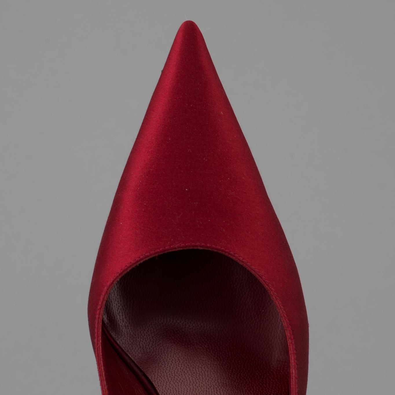 Red silk slingbacks by Sergio Rossi.