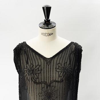 A 1920's pearl embroidered dress.