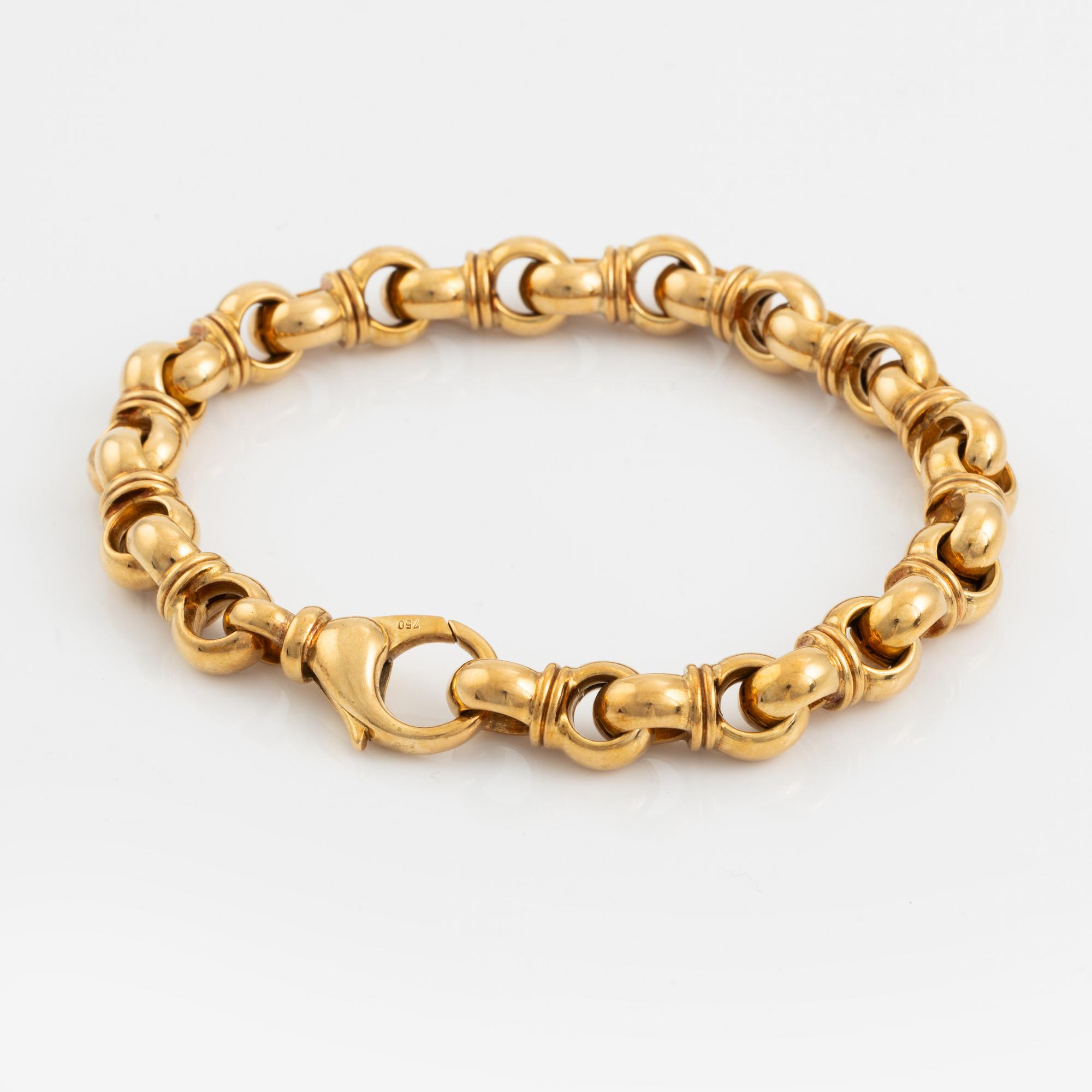An 18K gold Tännler bracelet.