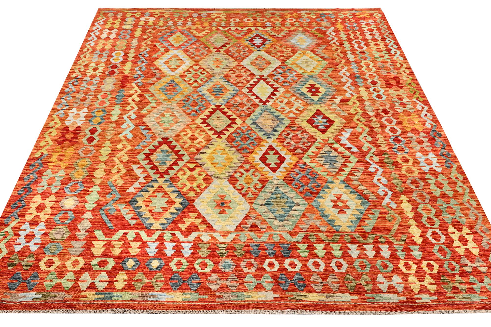 A Kilim carpet, c. 343 x 247 cm.