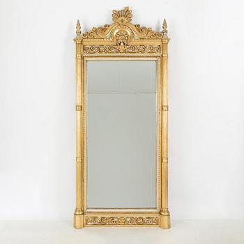 A Empire style mirror, second half of the 19th Century.