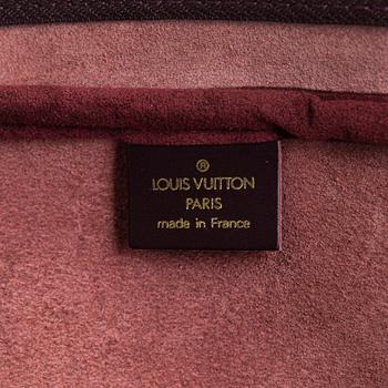 Louis Vuitton, a 'Taiga Kendall PM' weekend bag.