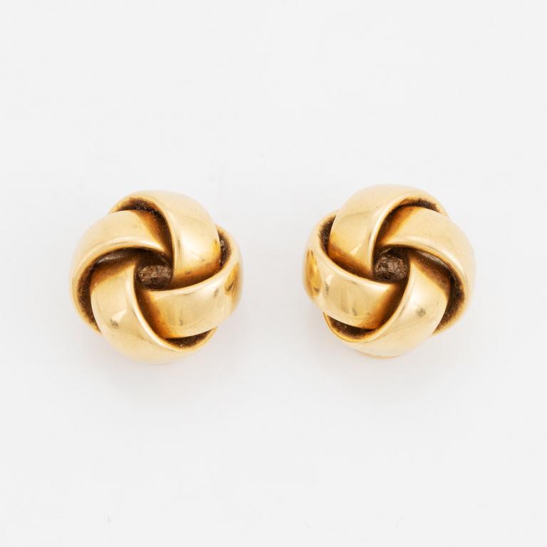 18K gold clip earrings.