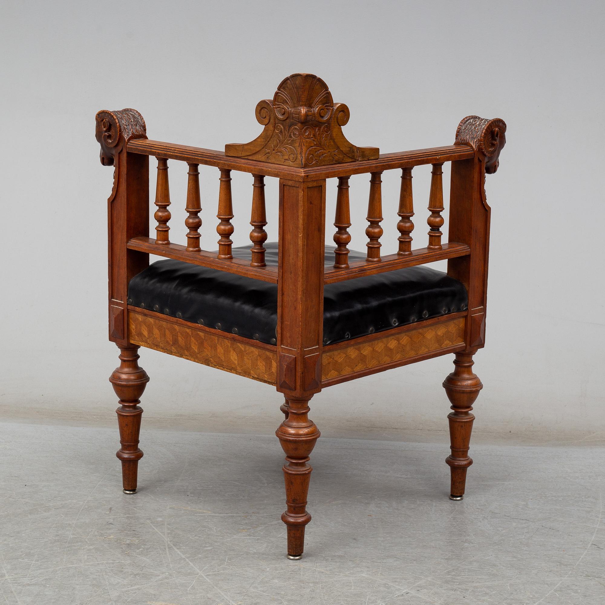 A late 19th century writing desk and armchair.