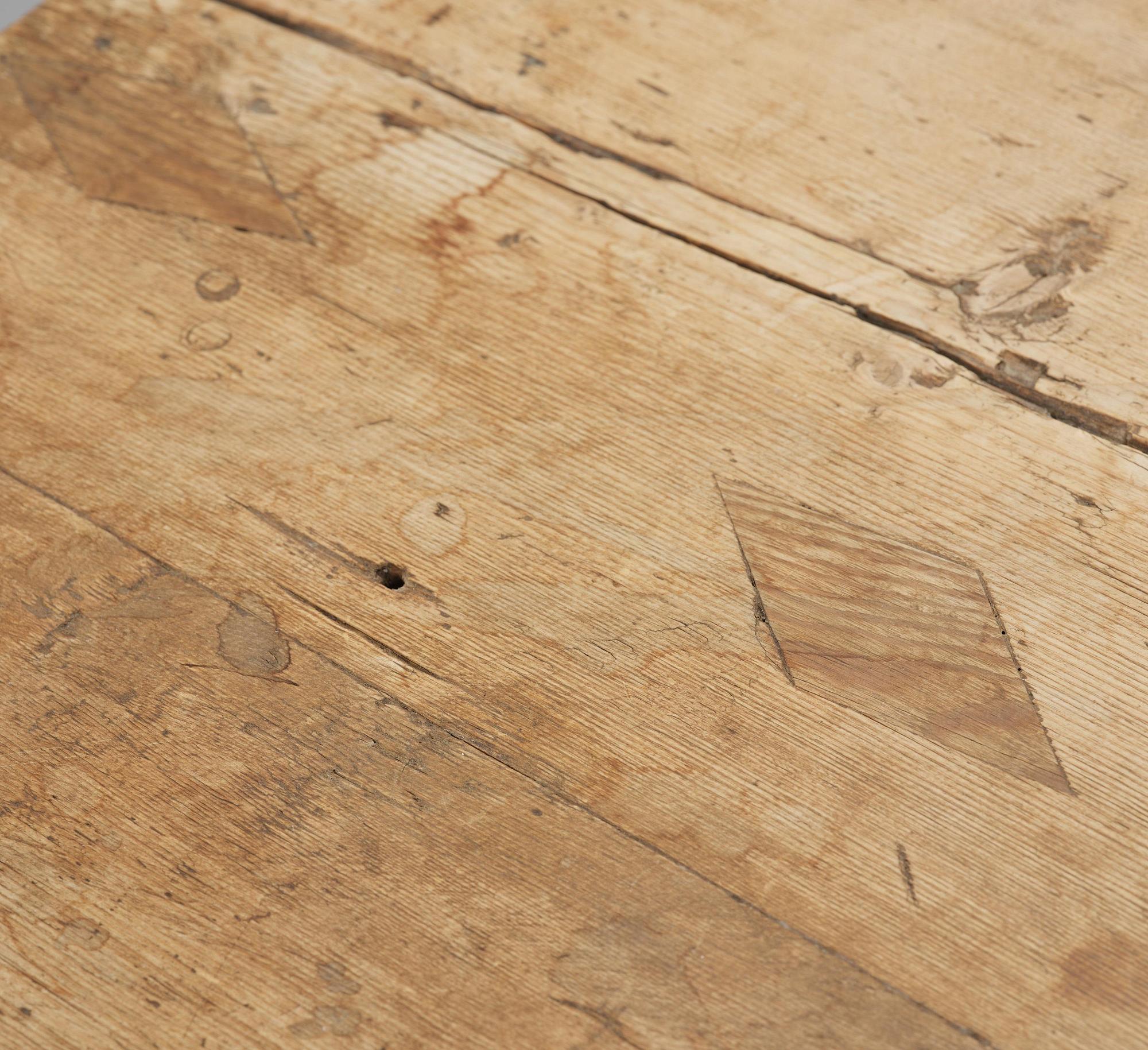 A pine trestle table, 20th century incorporating older elements.