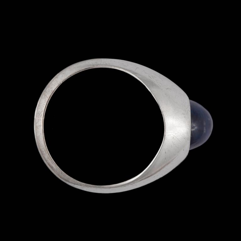 A cabochon cut sapphire ring.