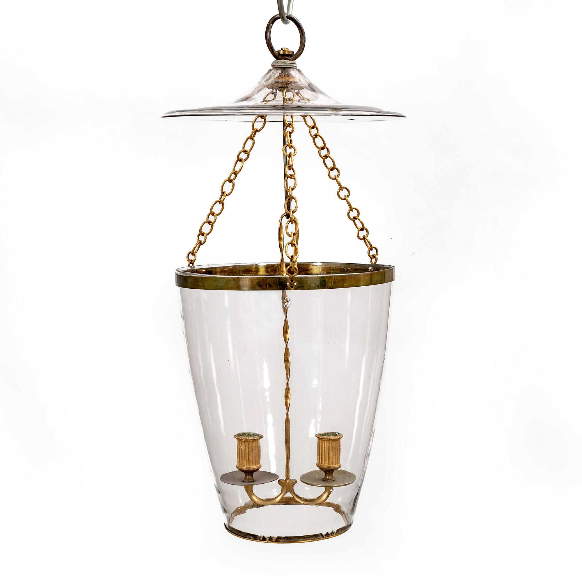 A 20th century glass pendant.