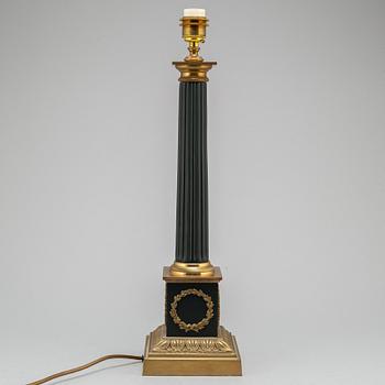 A modern Empire-style table lamp.