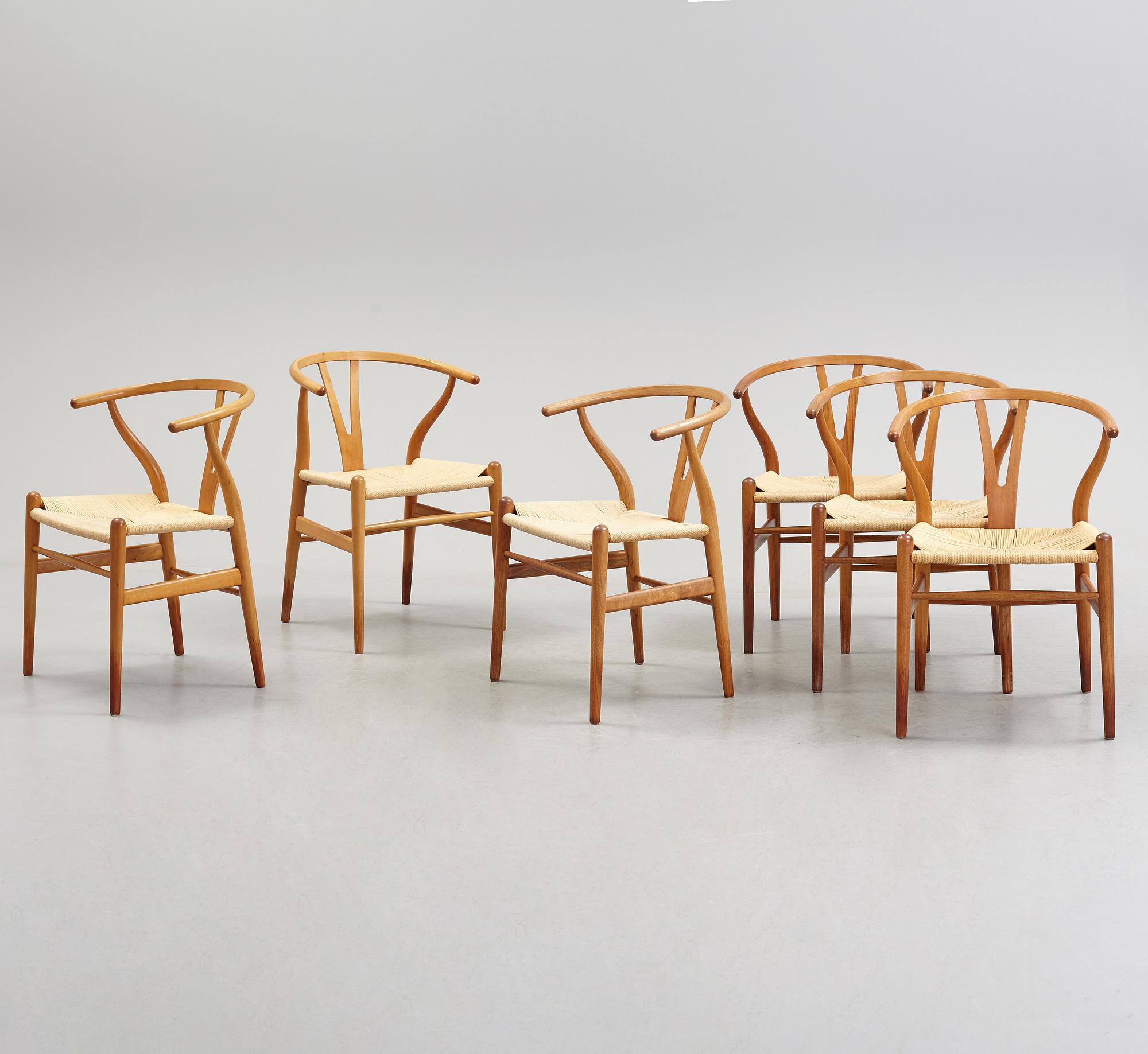 A set of four + two armchairs 'Y-chair' by Hans J Wegner, Carl Hansen & Son, Denmark.