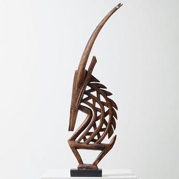 HEADDRESS Tshiwara/Ciwara (stylized male antelope). Wooden sculpture.
